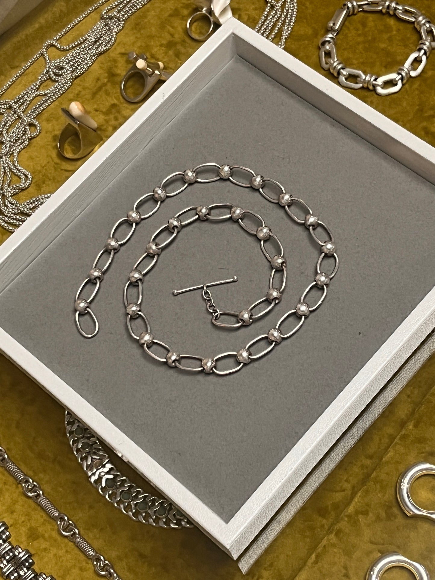 Loops Piercing Orbs Chain
